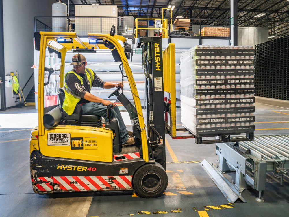 How to Use Industrial Conveyor Systems for a Smooth Production Process