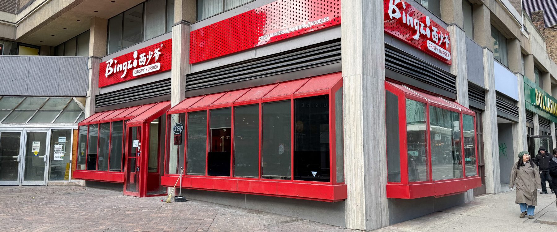 Completed restaurant design-build project showing Bingz Burger’s exterior storefront with bold red façade and modern branding.