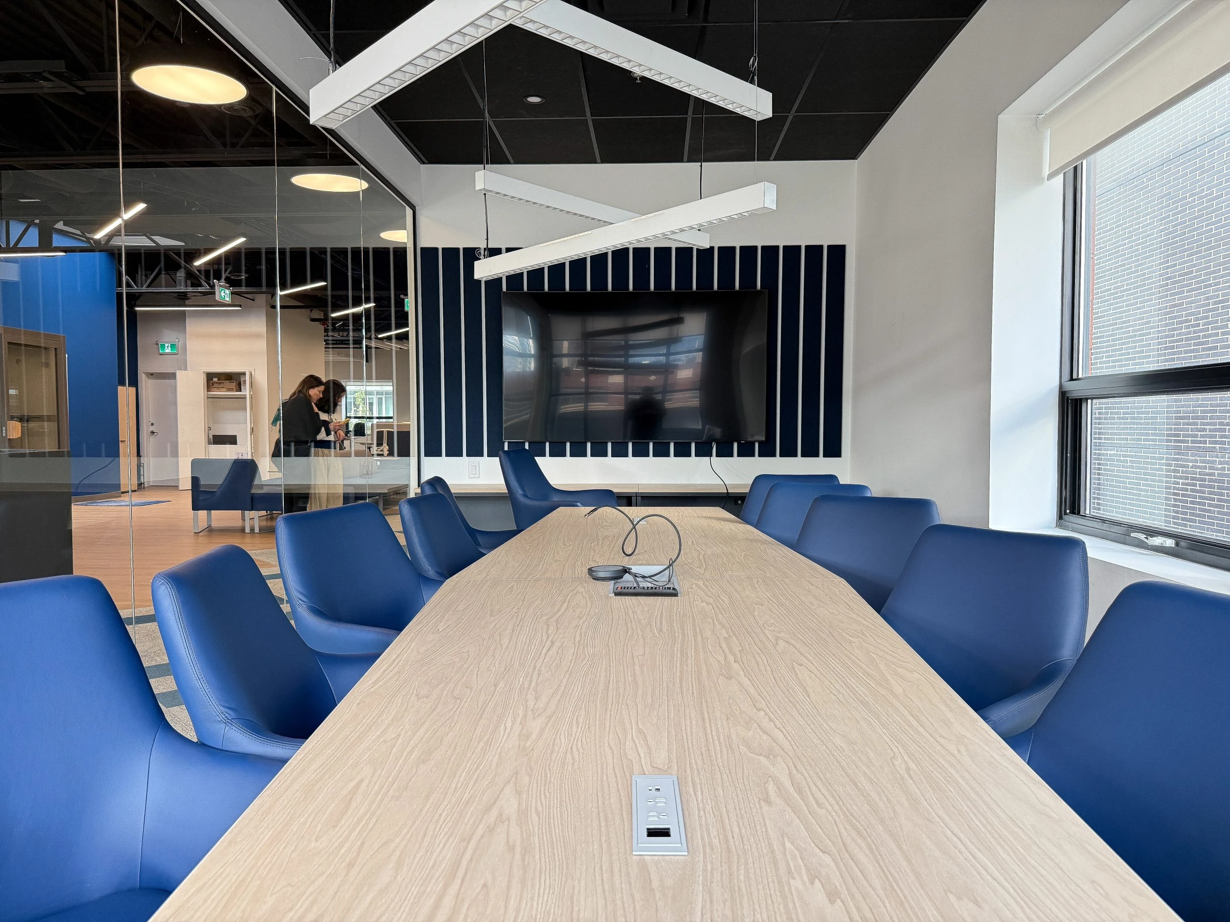 Neoen Toronto office build-out showcasing premium office design-build, open workspace layout, and contemporary commercial construction finishes.