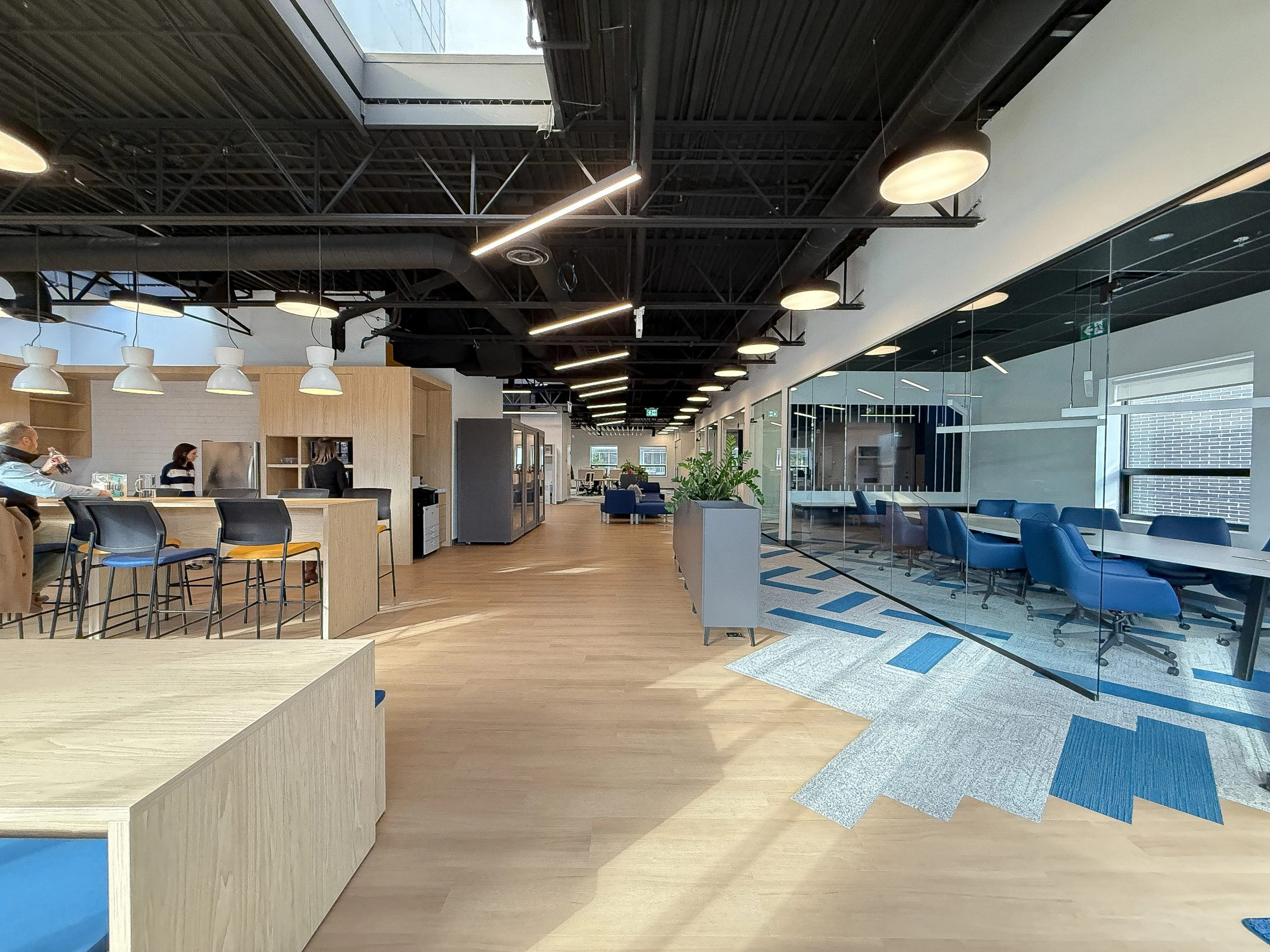Neoen Toronto office build-out showcasing premium office design-build, open workspace layout, and contemporary commercial construction finishes.