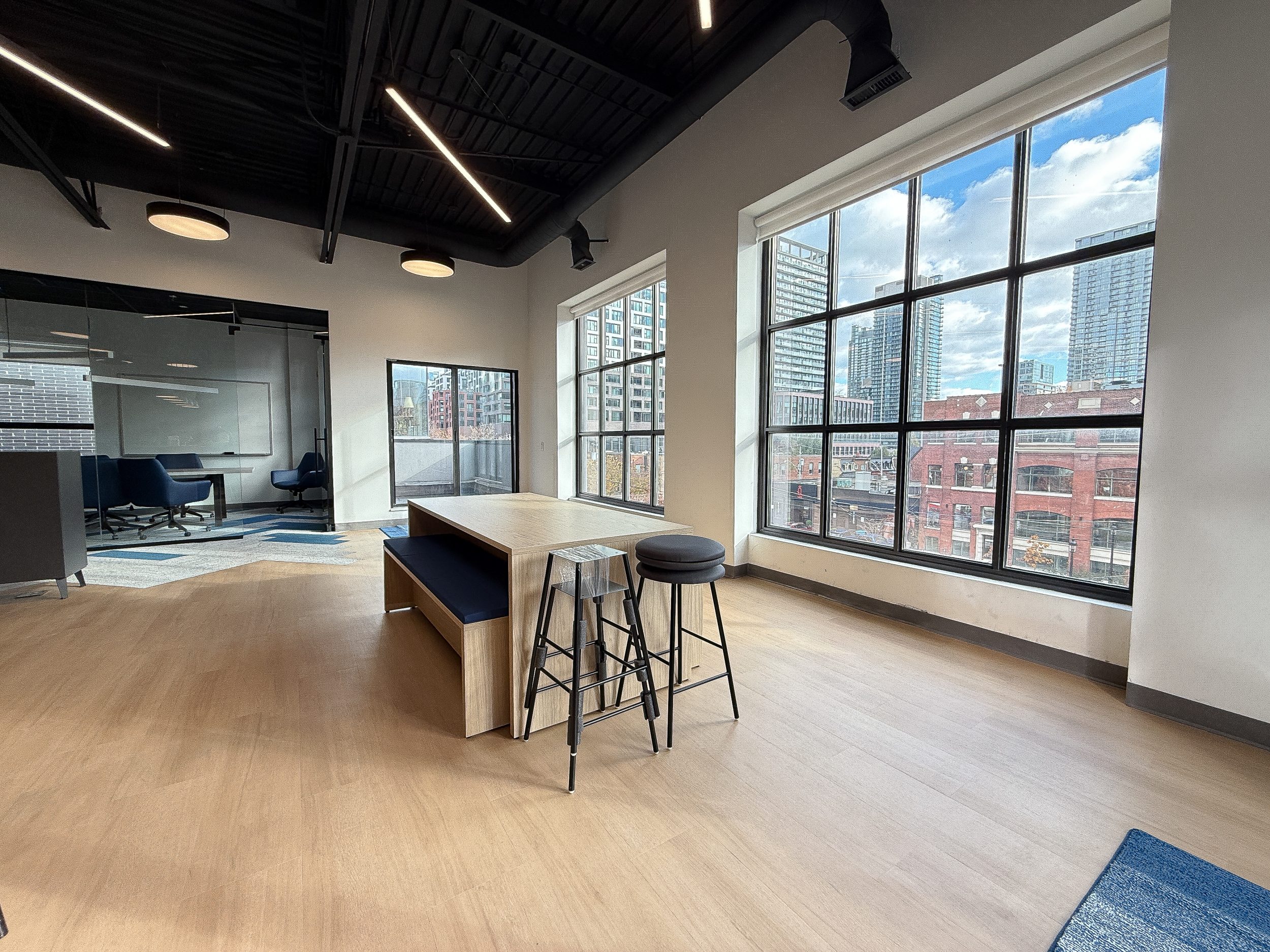 Commercial office construction project for Neoen with glass offices, collaborative work areas, and high-end Toronto interior build-out.