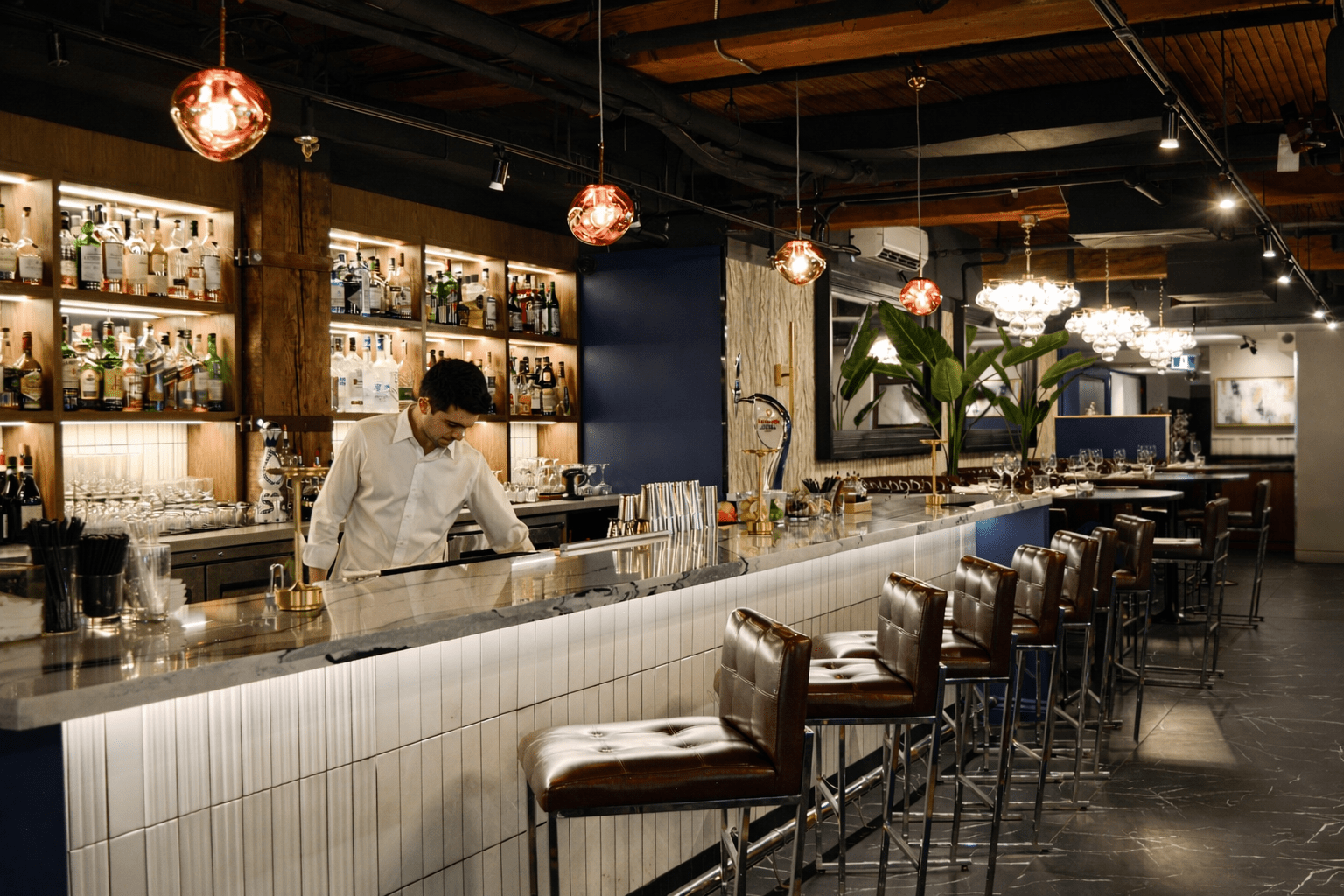 BLU Ristorante Toronto restaurant construction by GTA General Contractors featuring premium hospitality design, custom millwork, bar seating, and upscale dining interior.