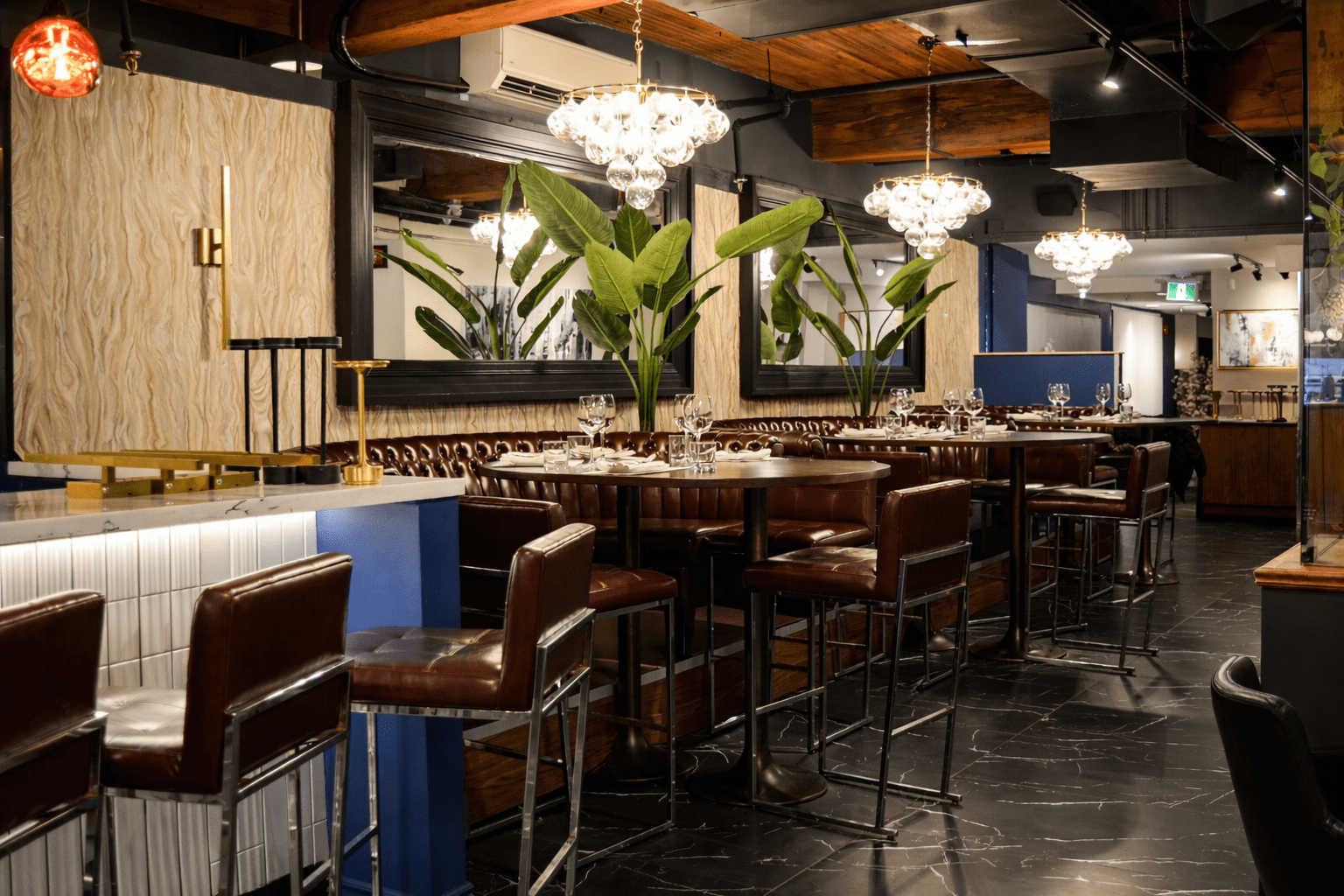 Luxury restaurant construction at BLU Ristorante Toronto by GTA General Contractors featuring upscale dining space, custom millwork, bar seating, and designer lighting.