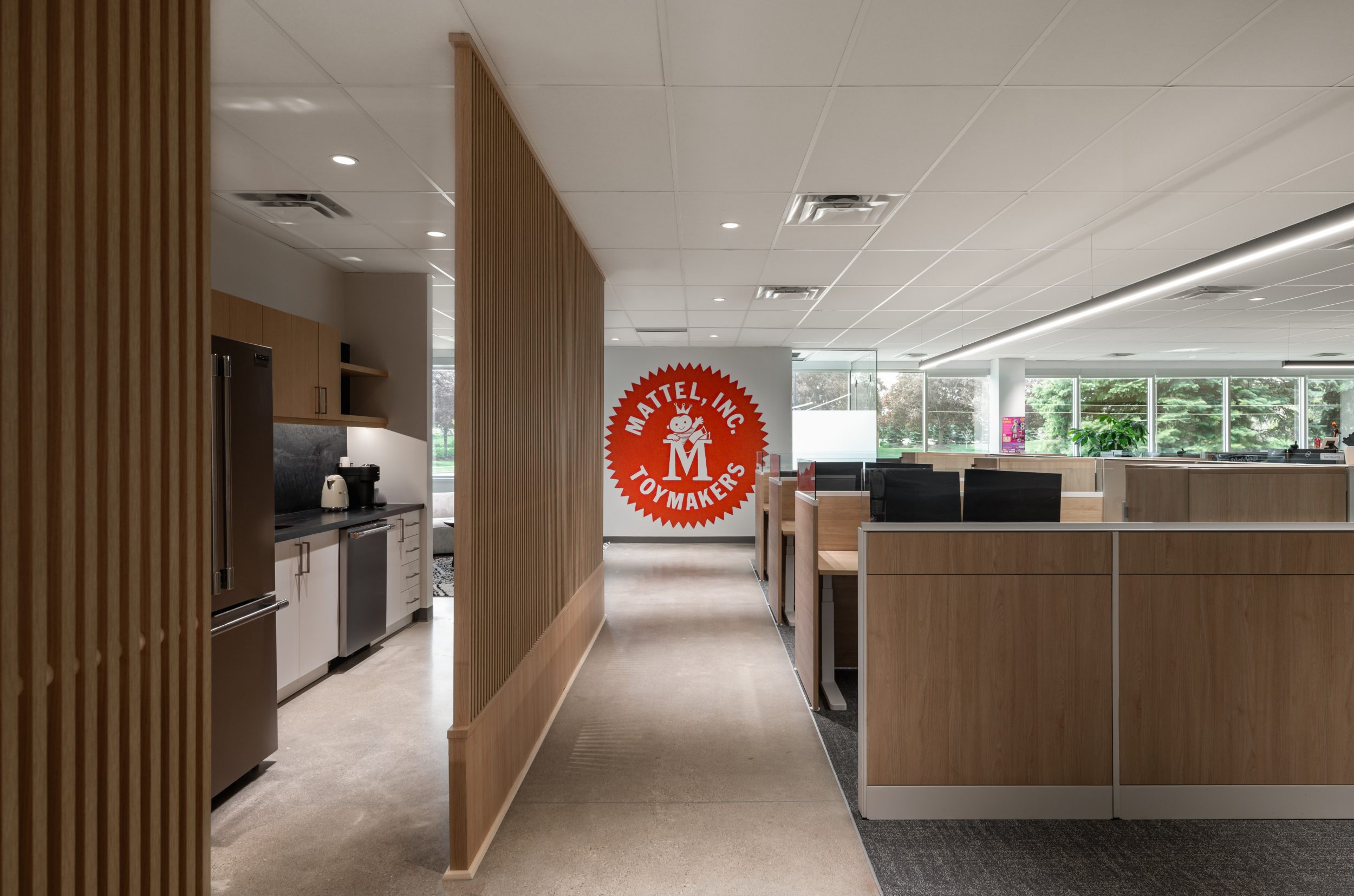 Mattel Canada Headquarters design-build office renovation completed by GTA General Contractors in Mississauga, Ontario featuring a modern open-concept workspace with custom millwork and collaborative office design.