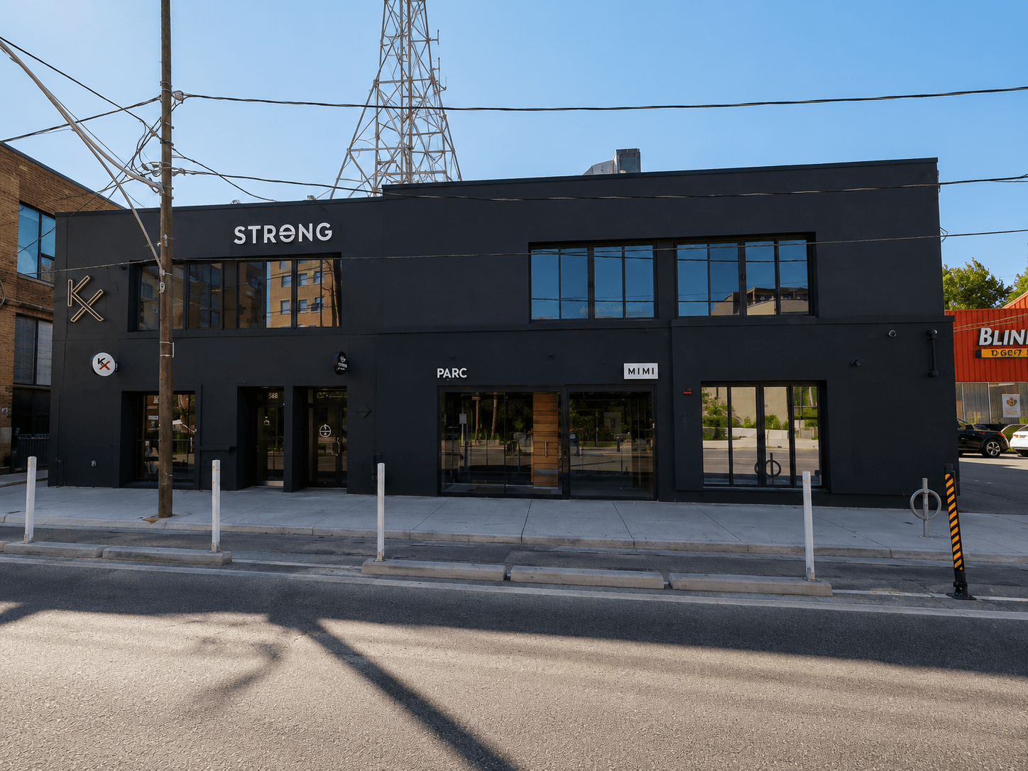 Exterior of STRONG Pilates Yorkville commercial fitness facility completed by GTA General Contractors featuring modern storefront construction, commercial building renovation, architectural façade upgrades, and contemporary exterior finishes in Toronto.